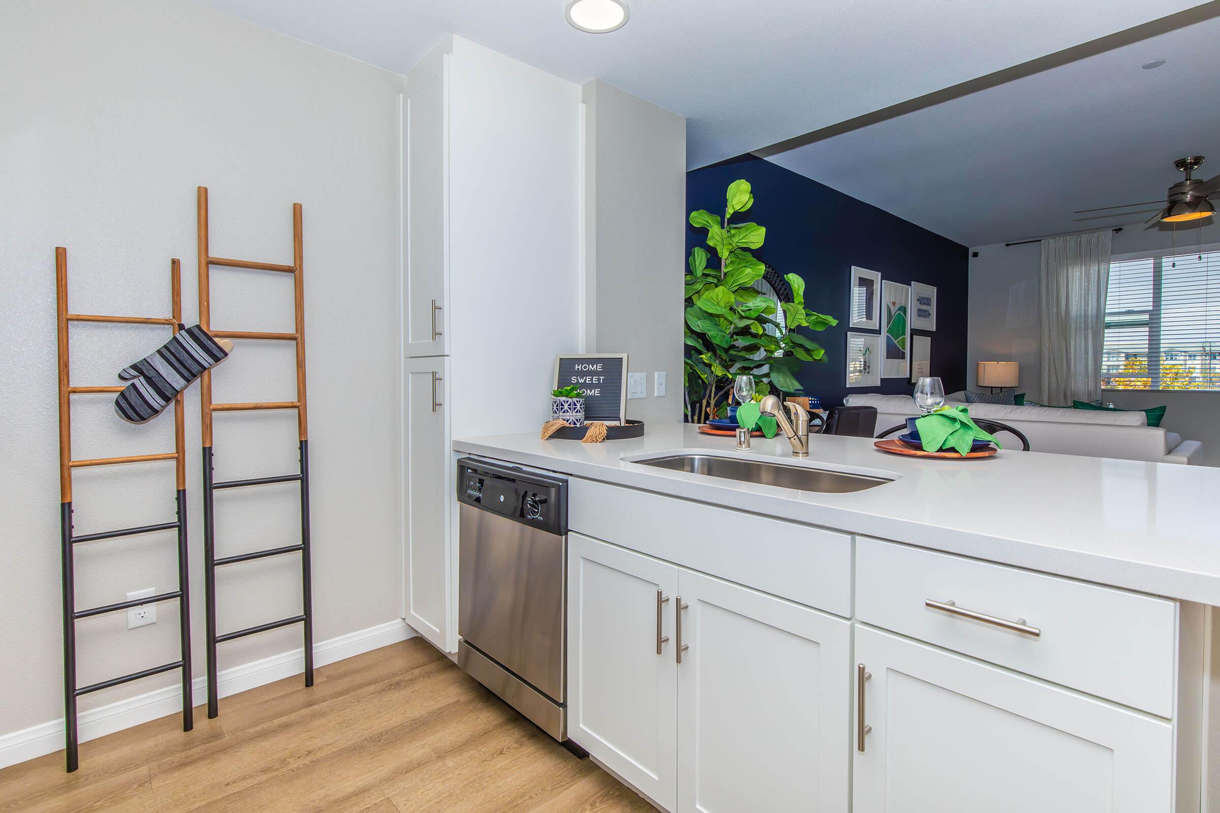 a kitchen with a stove and a sink