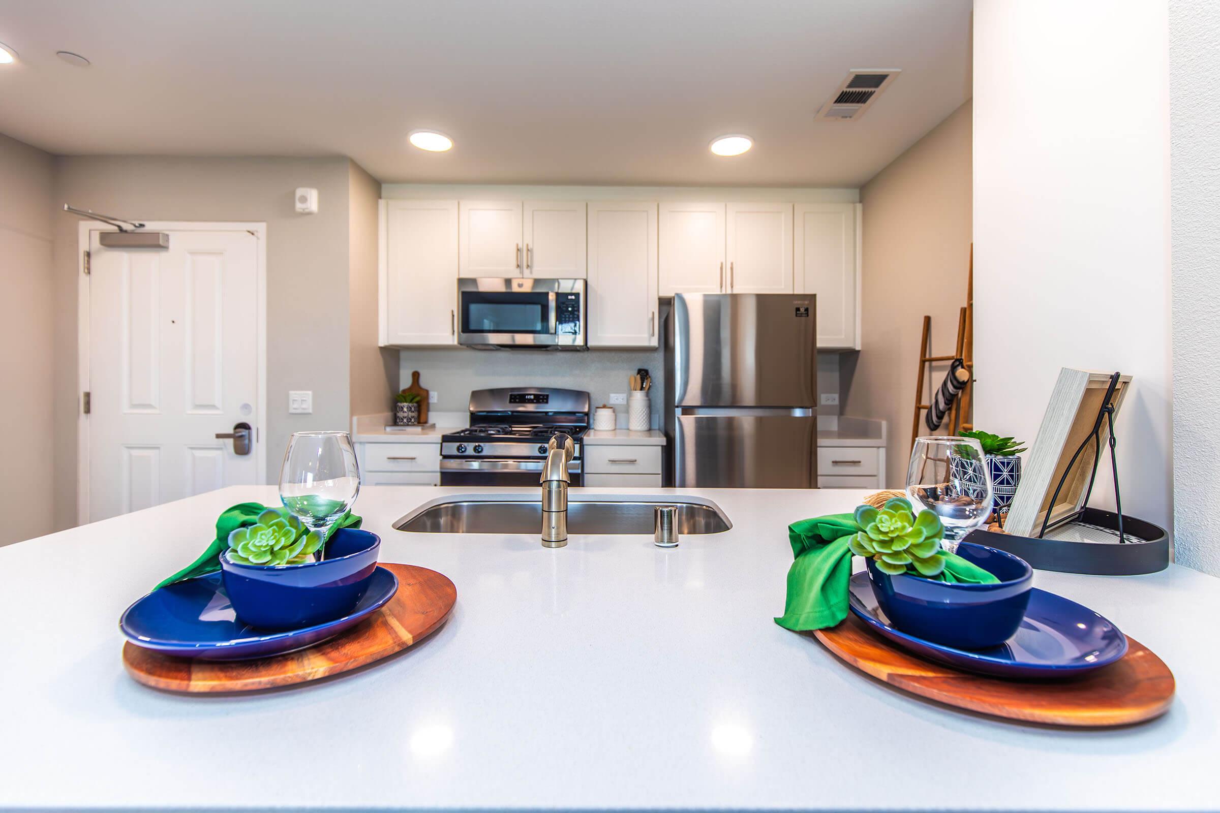 a kitchen with a cake on a table