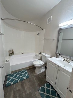 a room with a sink and a shower