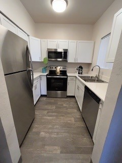 a kitchen with stainless steel appliances