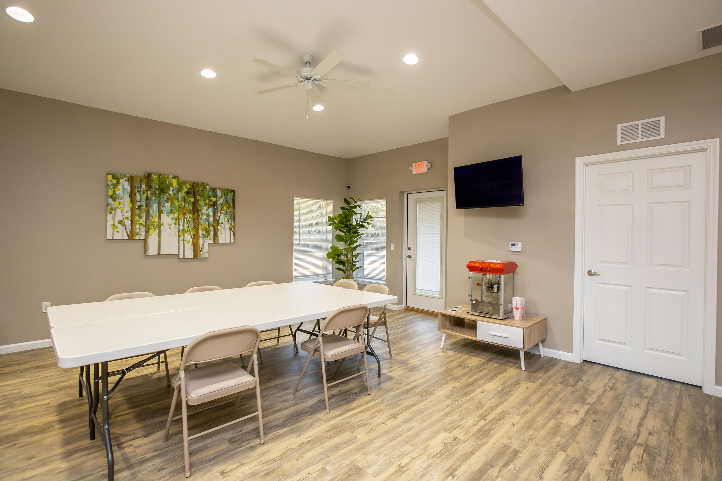 a living room with a wood floor