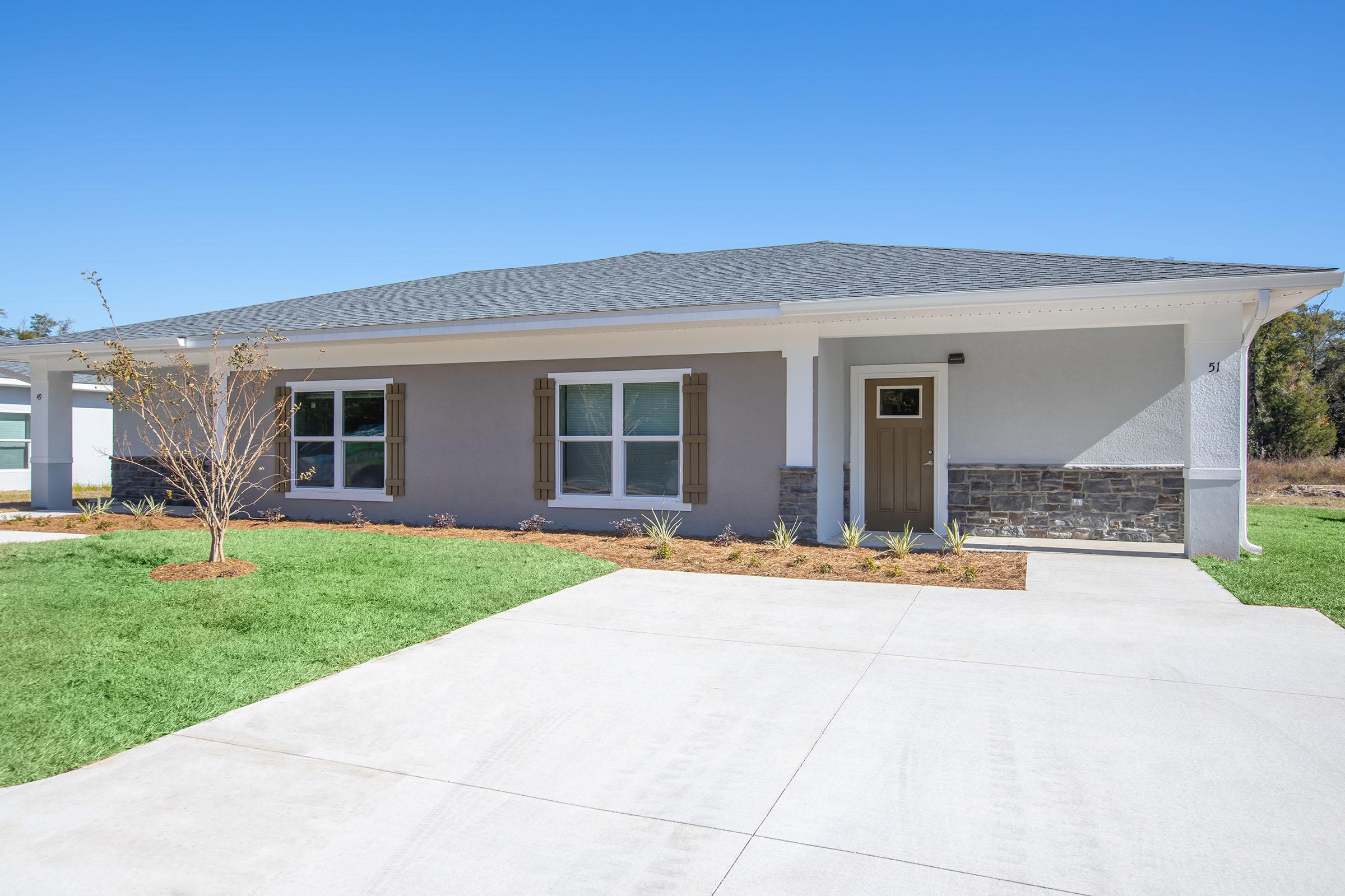 a large lawn in front of a house