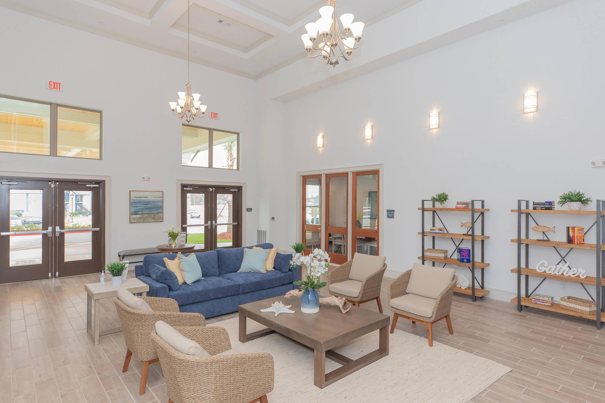 a living room filled with furniture and a fireplace