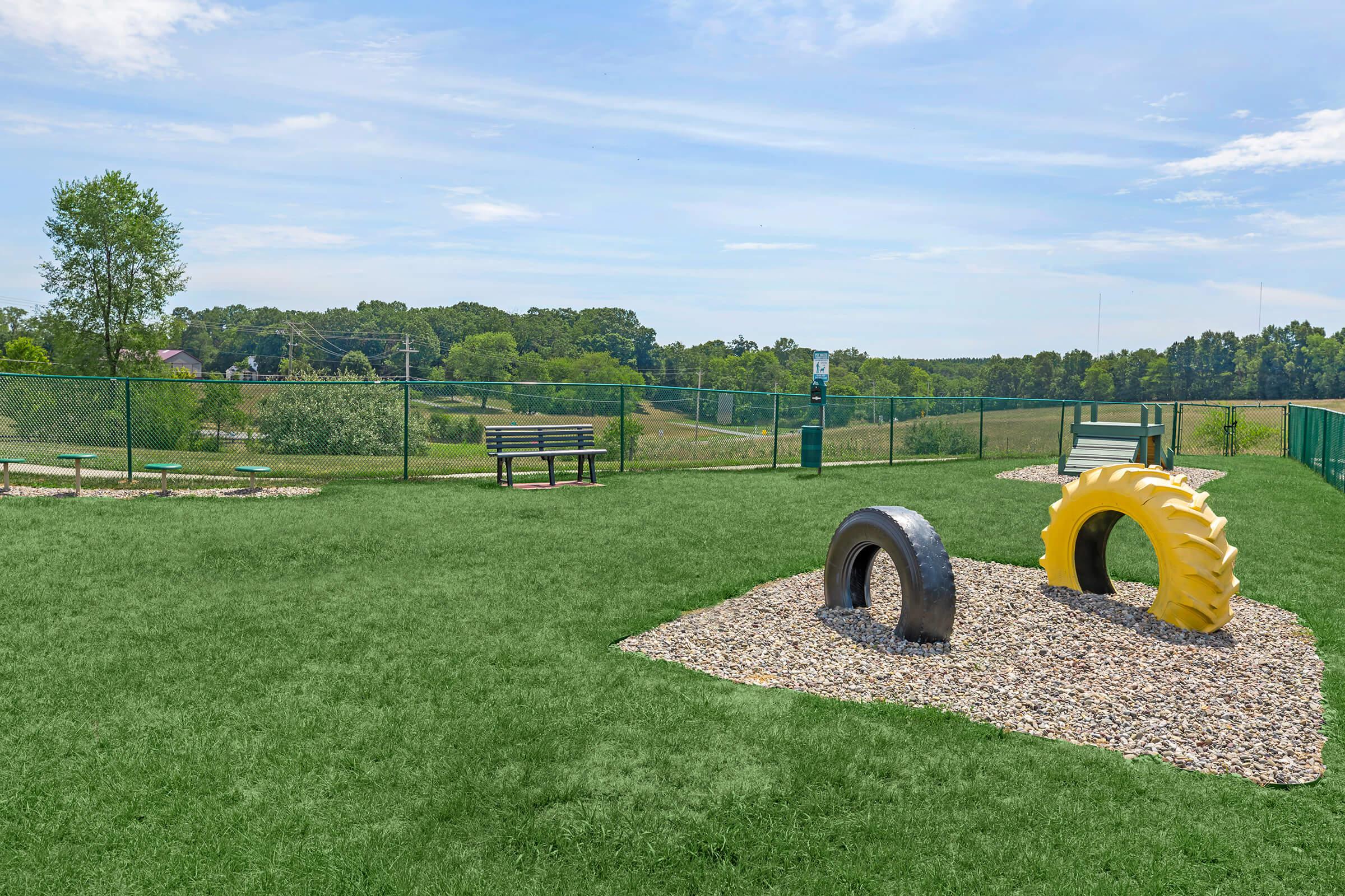 a truck that is sitting on top of a grass covered field