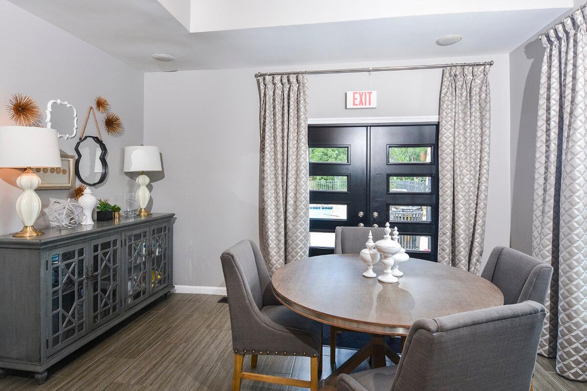 a living room with a couch and a chair