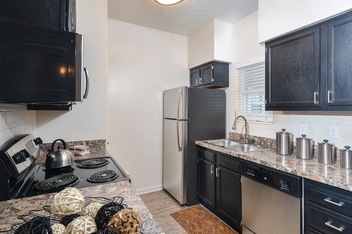 a modern kitchen with stainless steel appliances