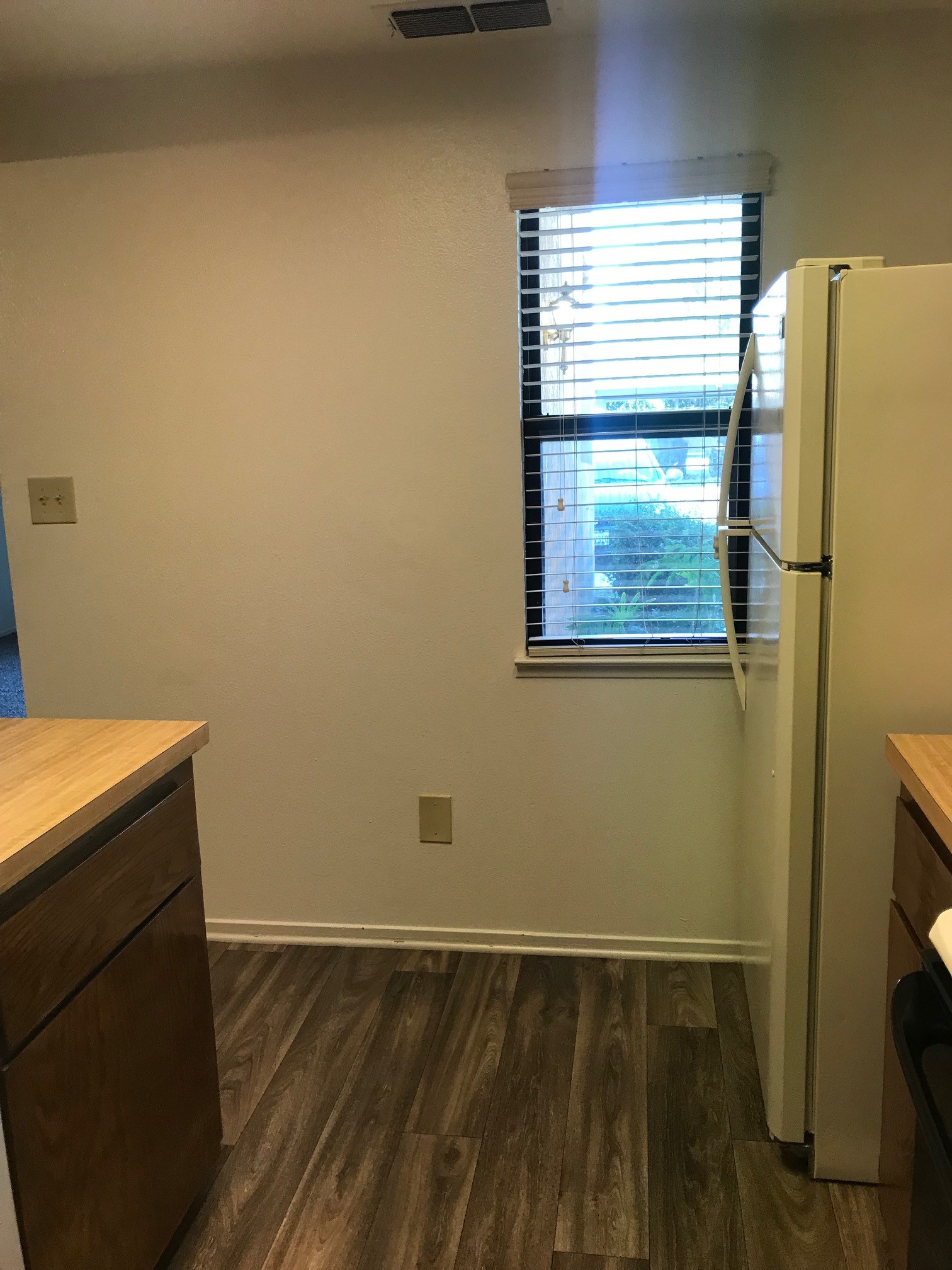 Kitchen with a white fridge