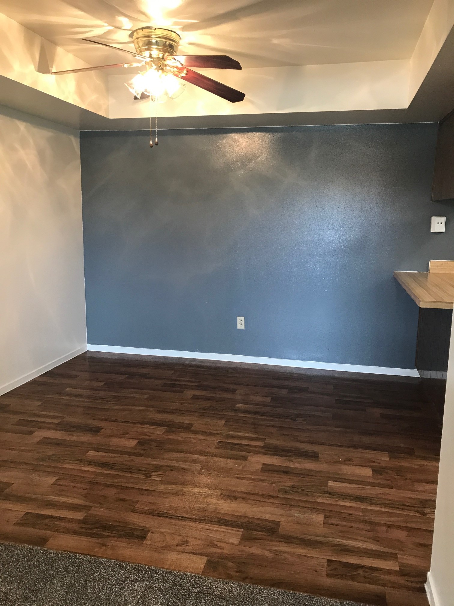 Vacant dining room with wooden floors