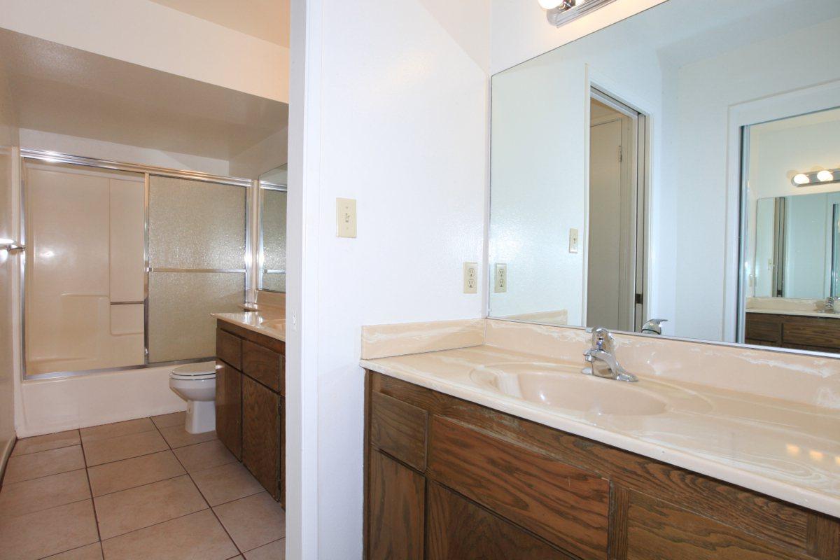 Bathroom with tile flooring