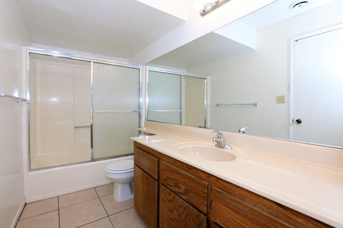 Vacant bathroom with tile flooring