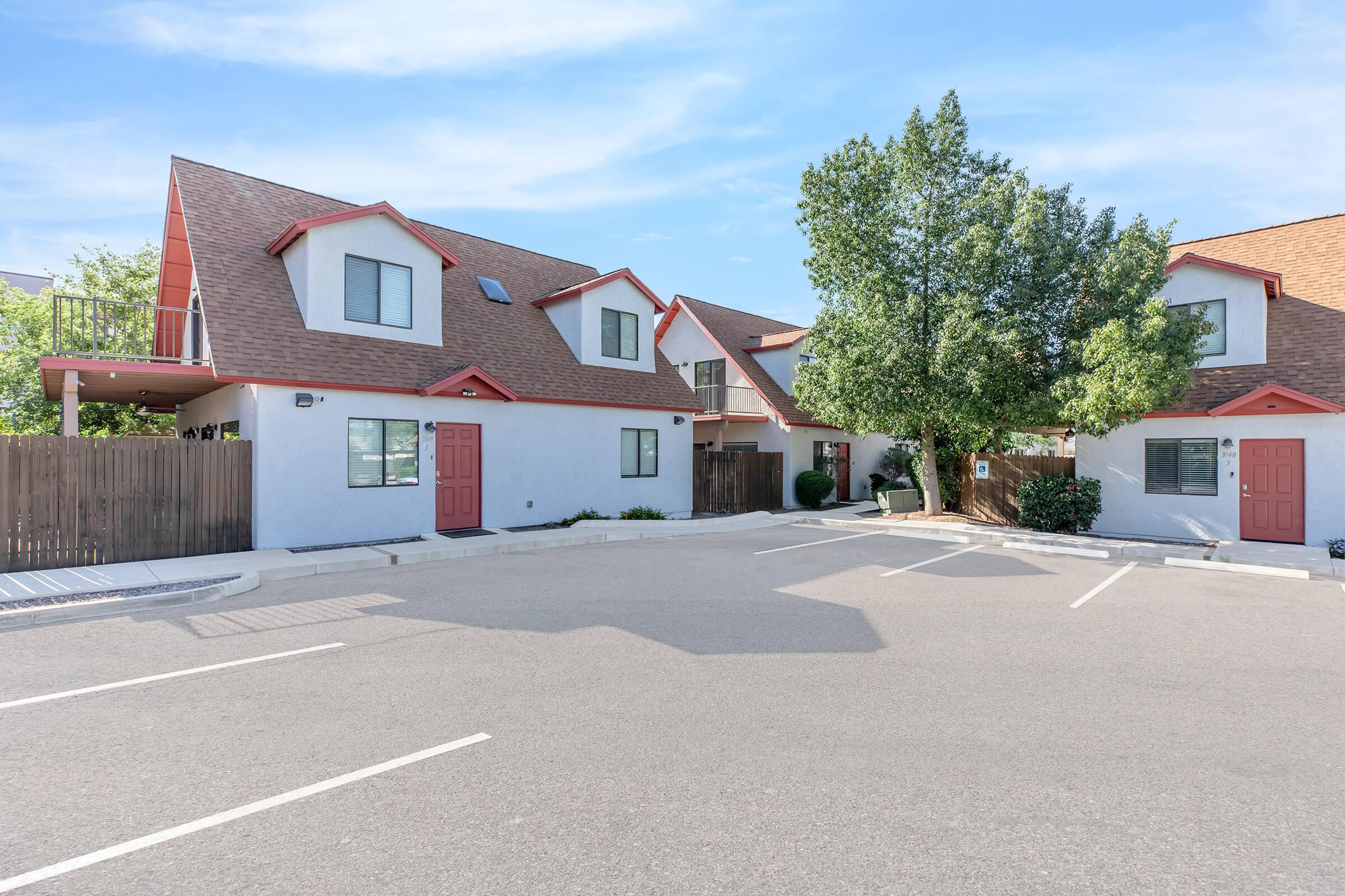 a small house in a parking lot