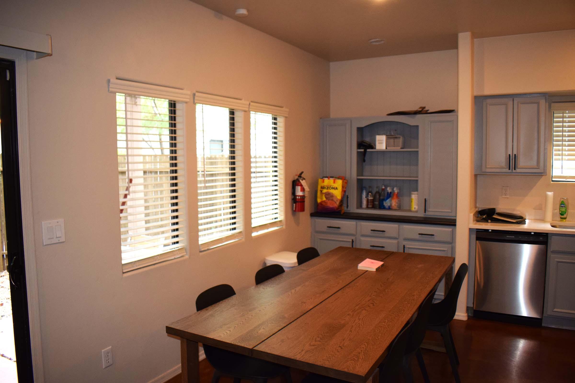 a modern kitchen with an island in the middle of a room