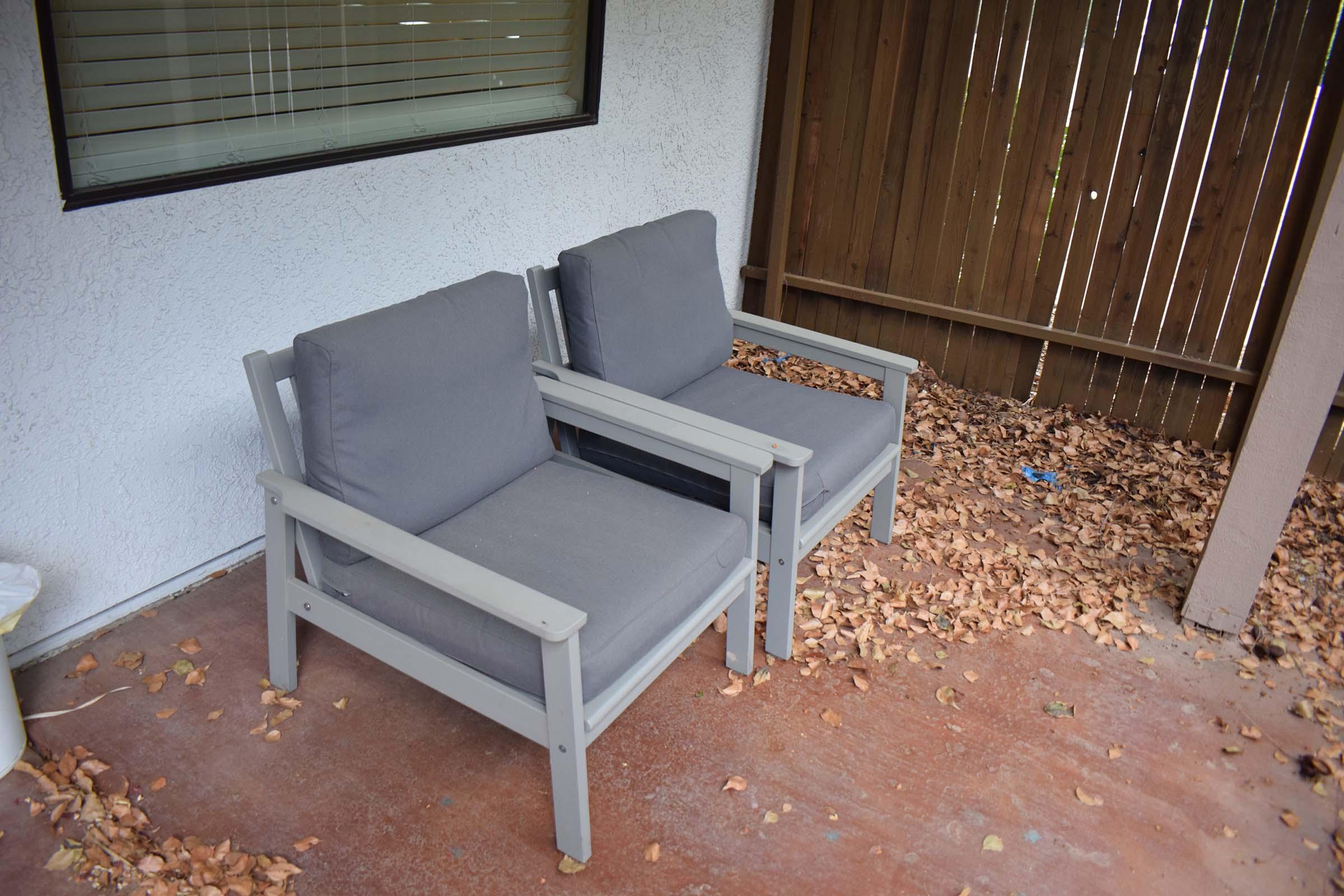 a chair sitting next to a fireplace