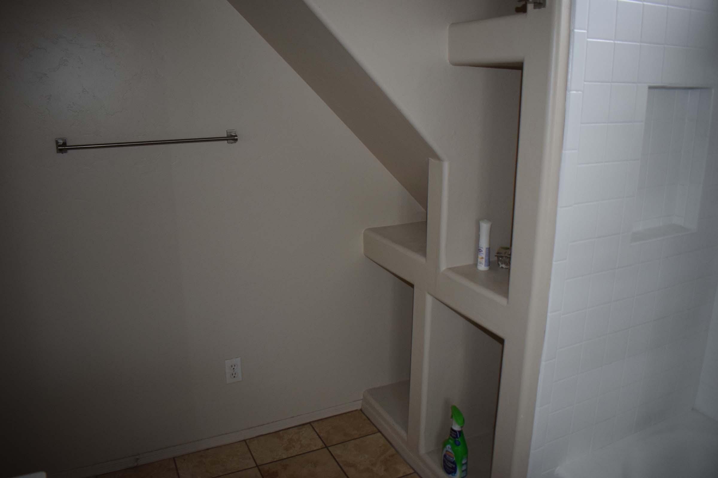 a view of the shower and sink