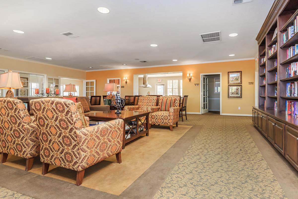 a living room filled with lots of furniture