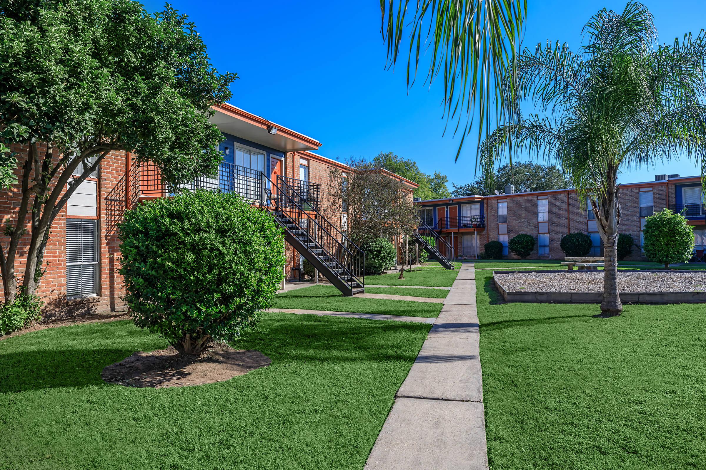 a large lawn in front of a house