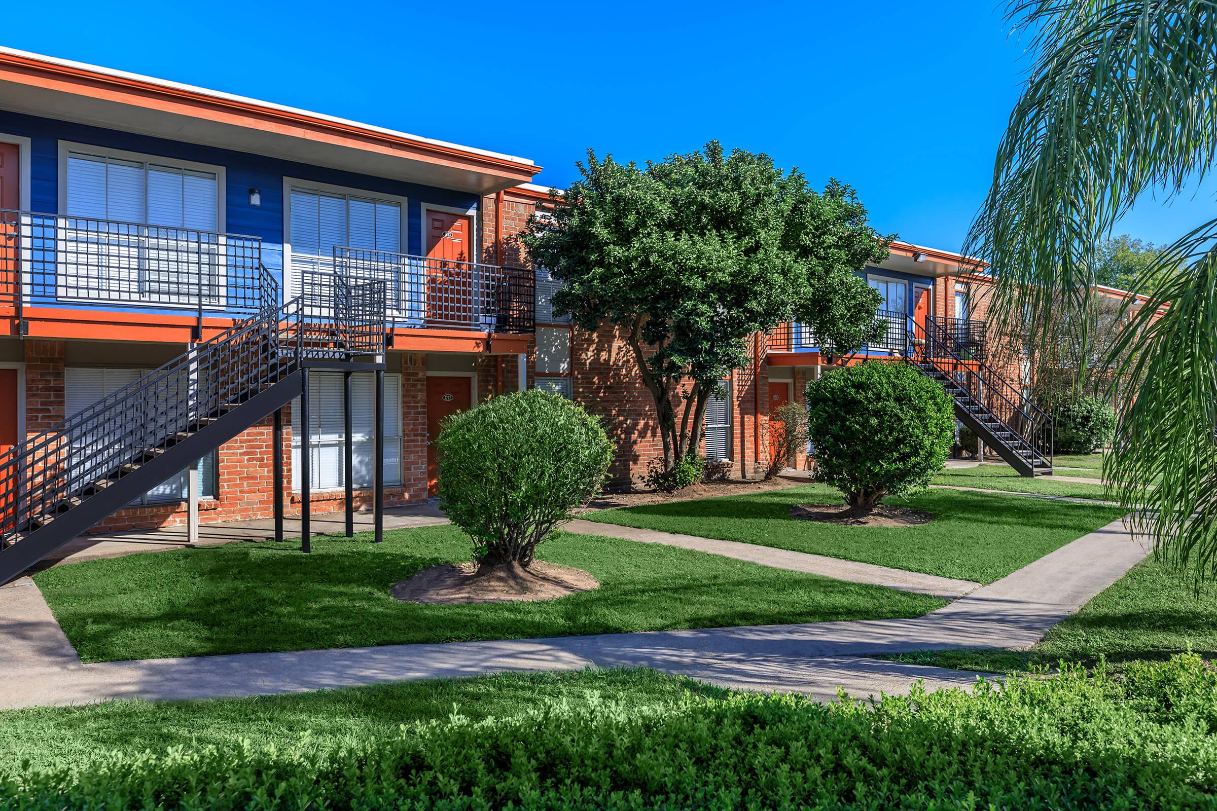 a house with trees in the background