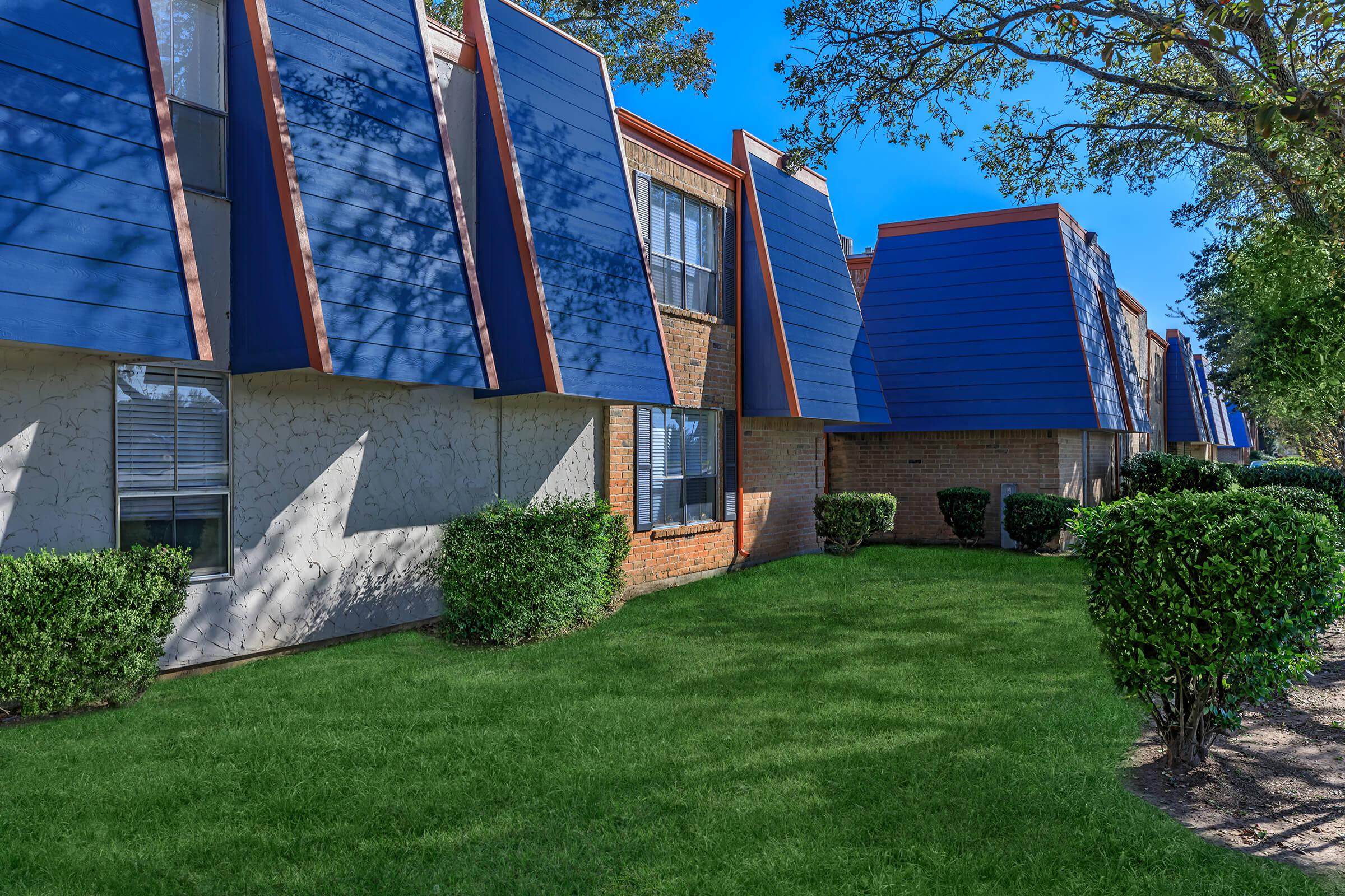 a house covered in green grass