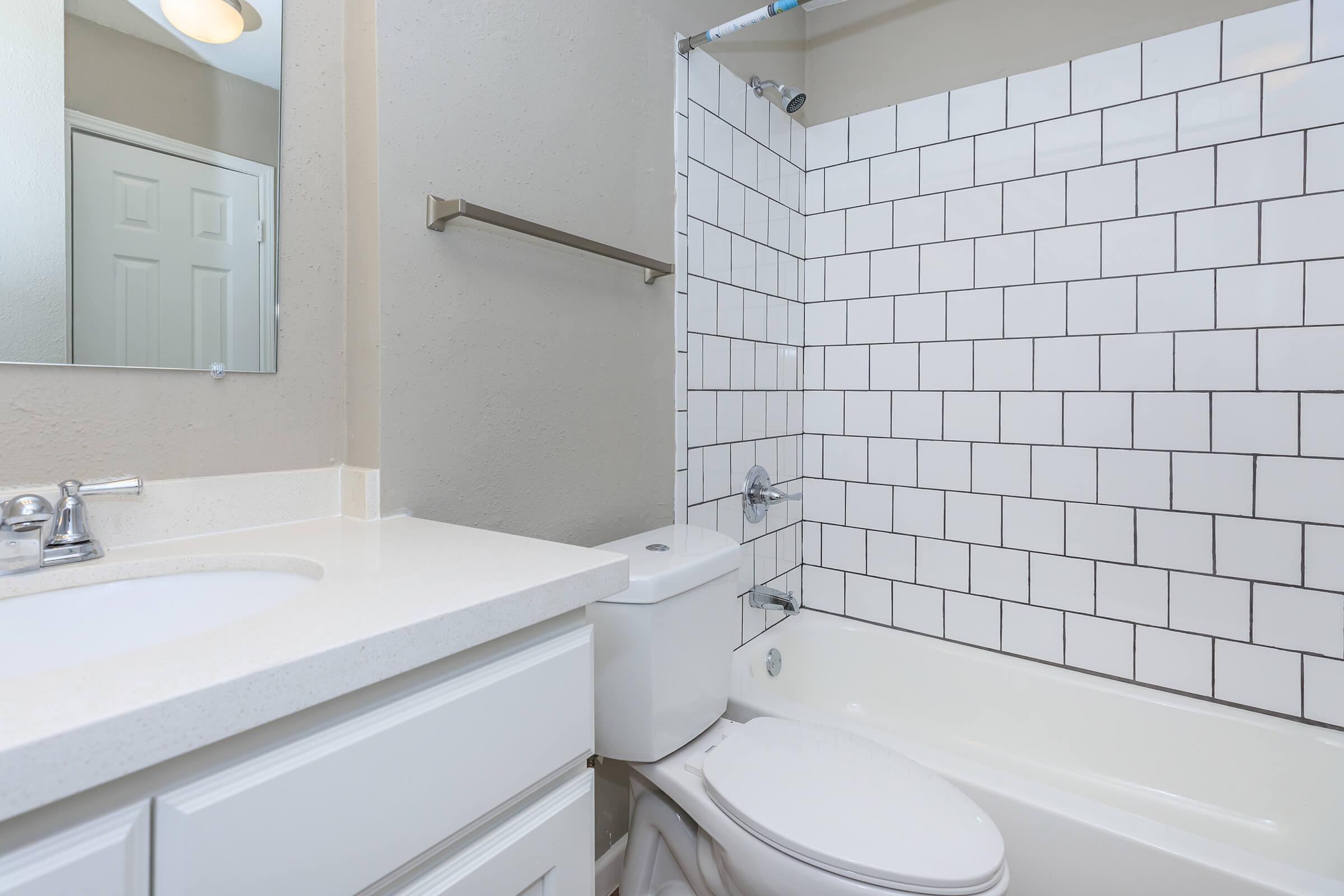 a sink sitting under a window