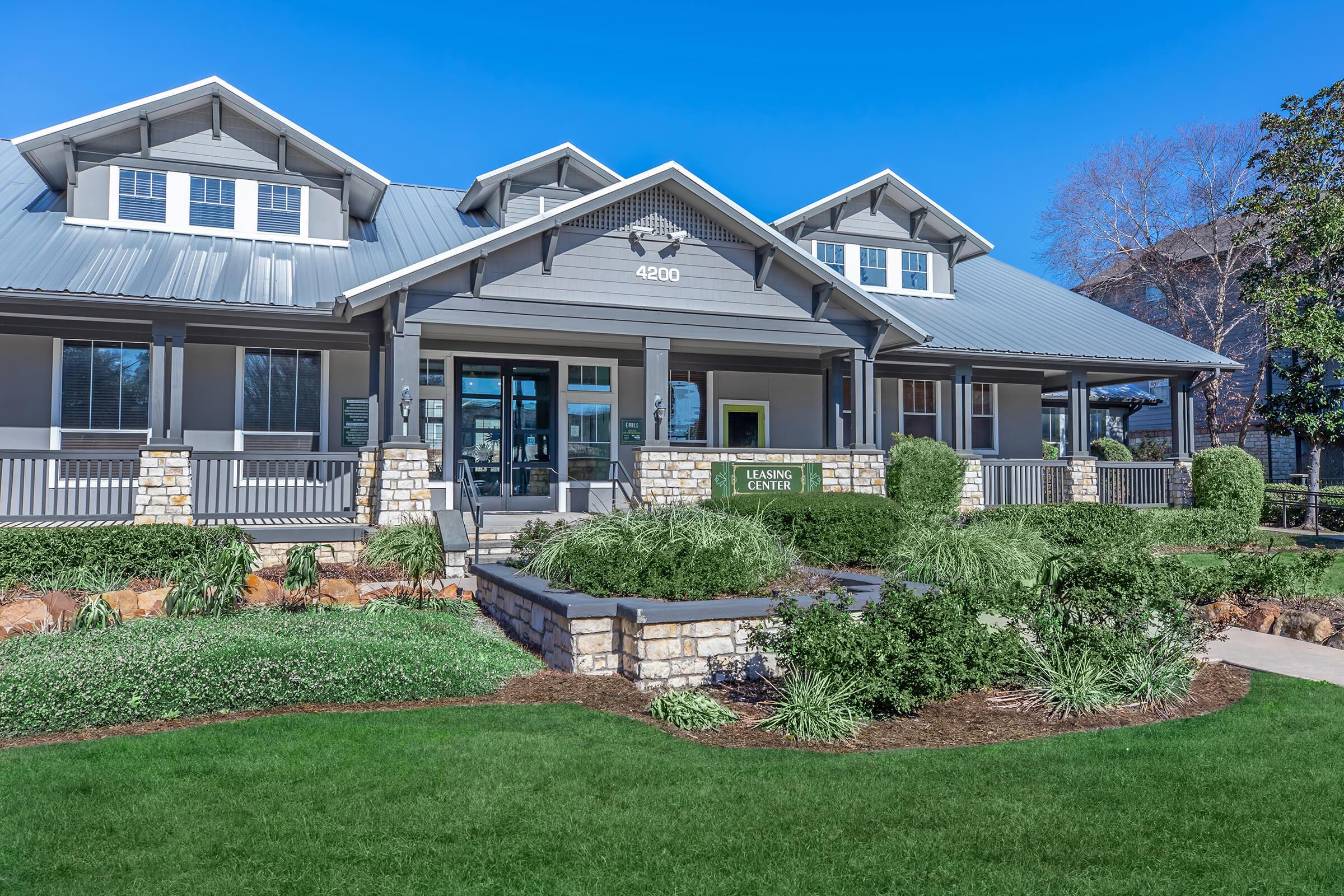 a large lawn in front of a house