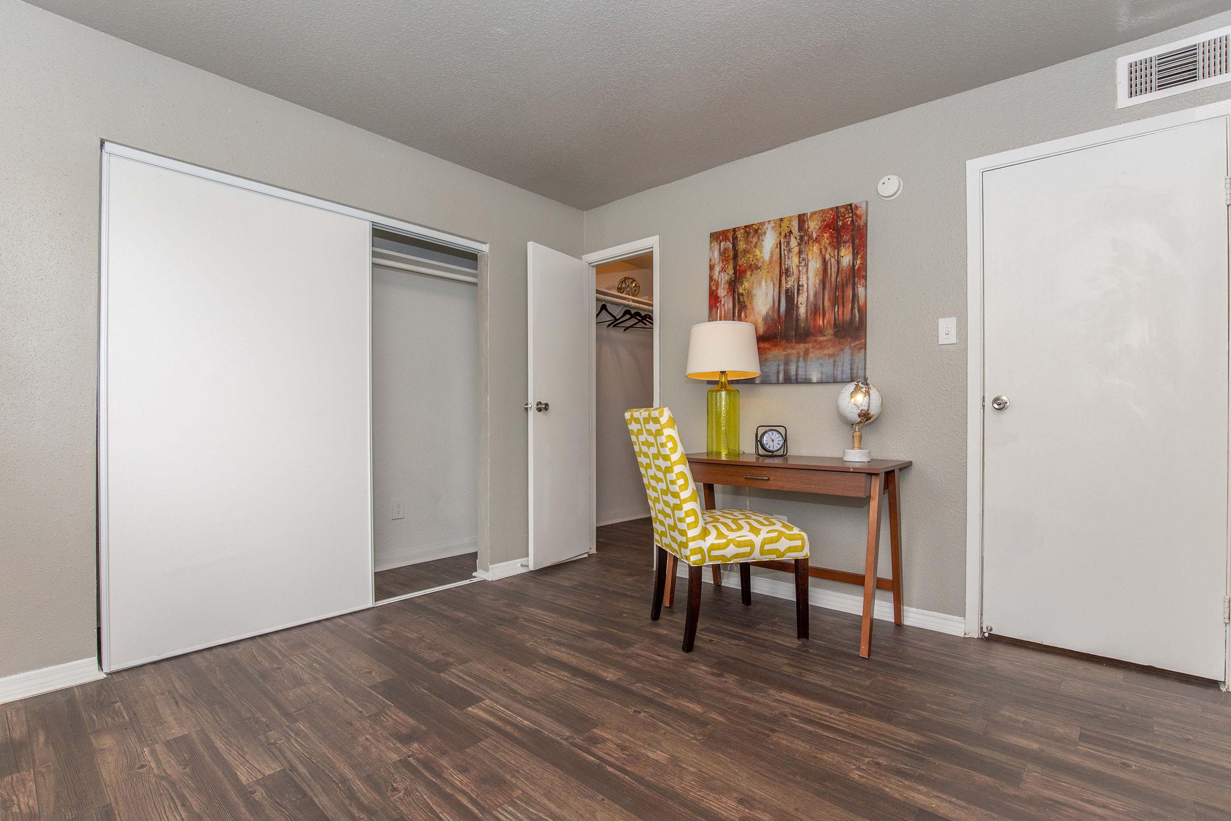 a room filled with furniture and a table