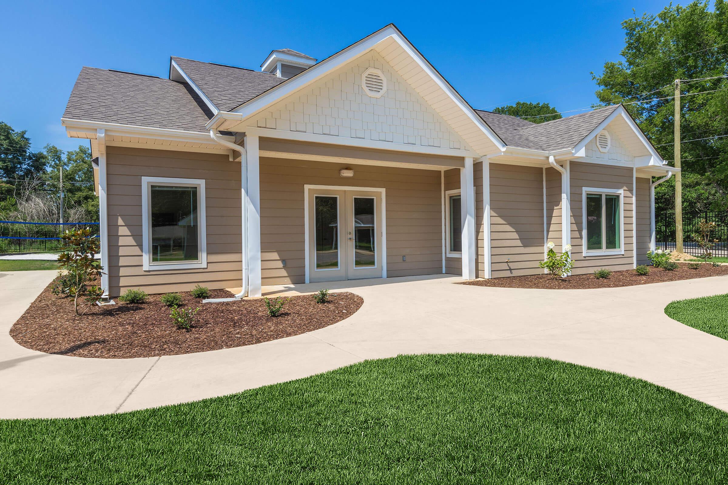 a large lawn in front of a house