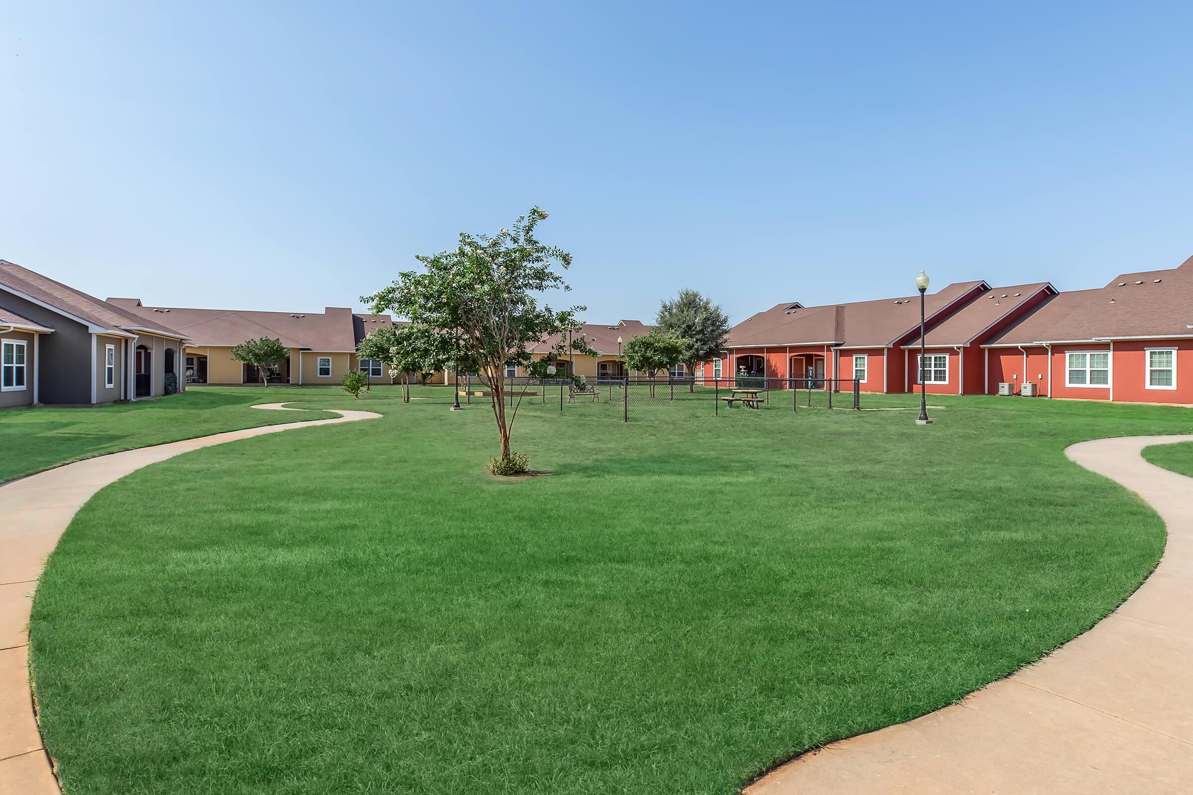 a large lawn in front of a house