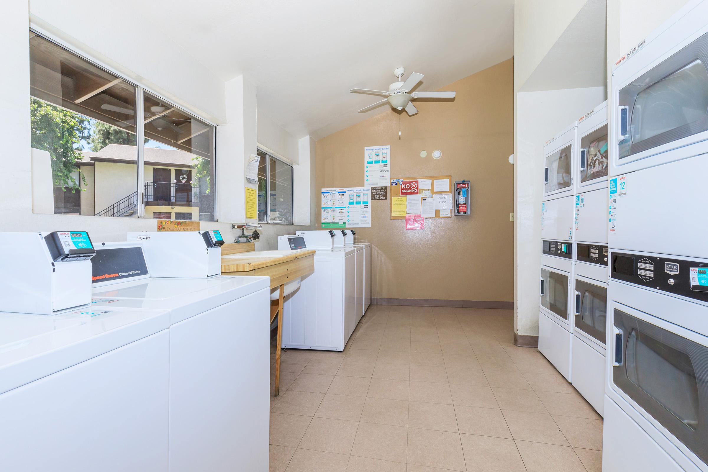 a kitchen with a sink and a refrigerator