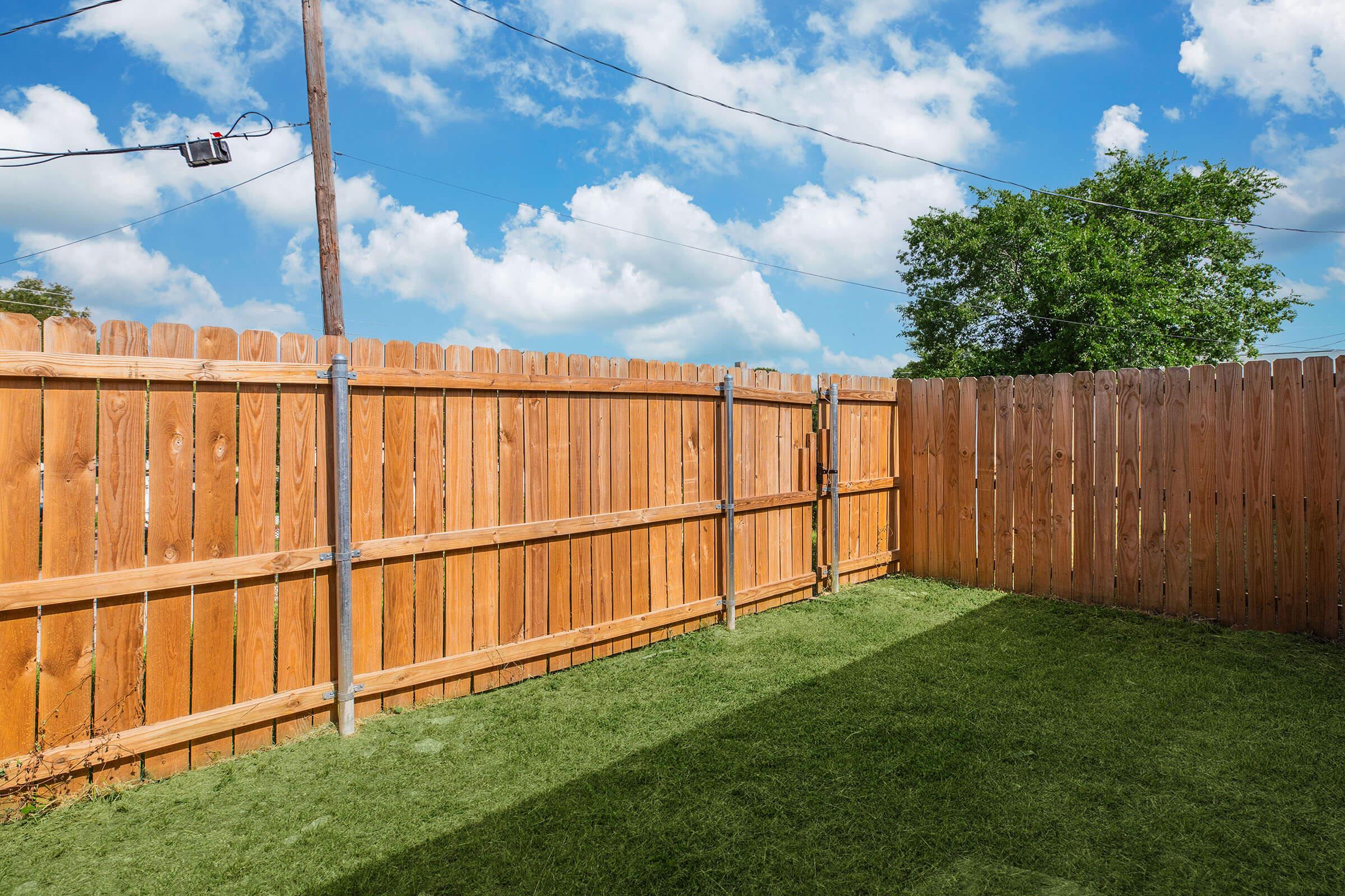 a close up of a green fence