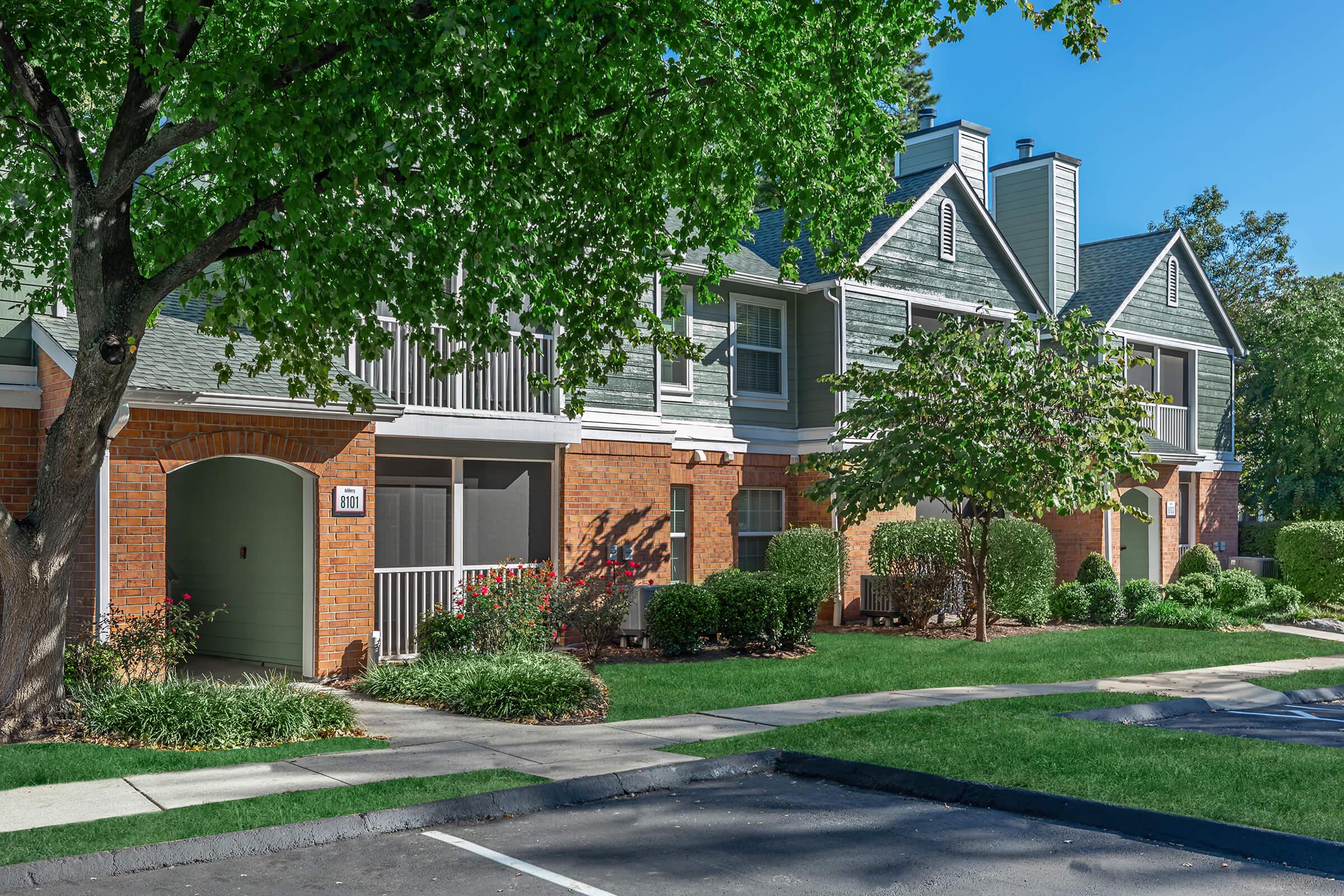 a residential street in front of a house