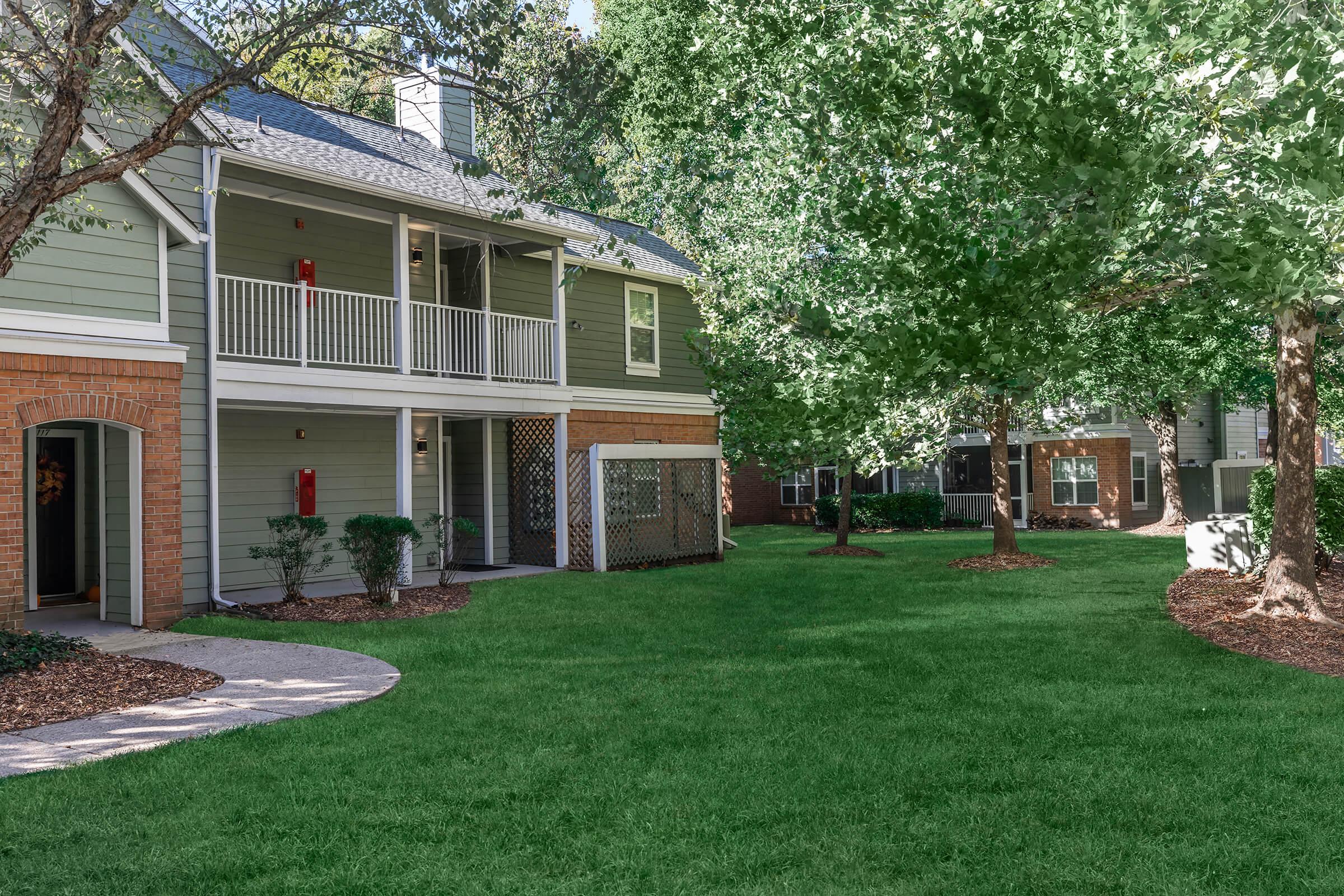 a large lawn in front of a house