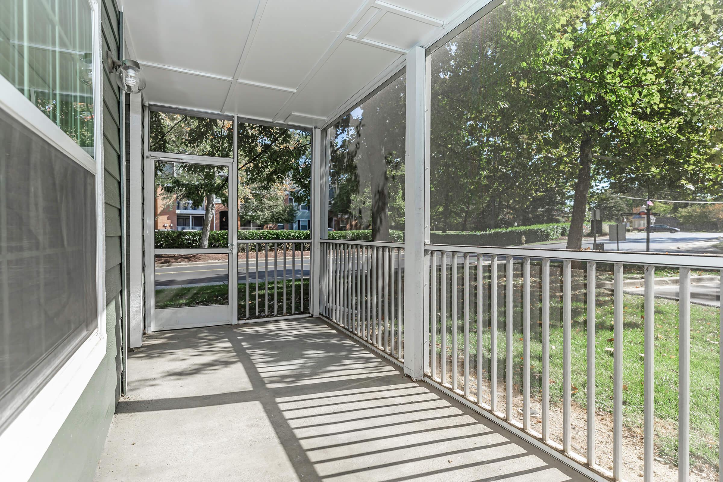 a gate in front of a fence