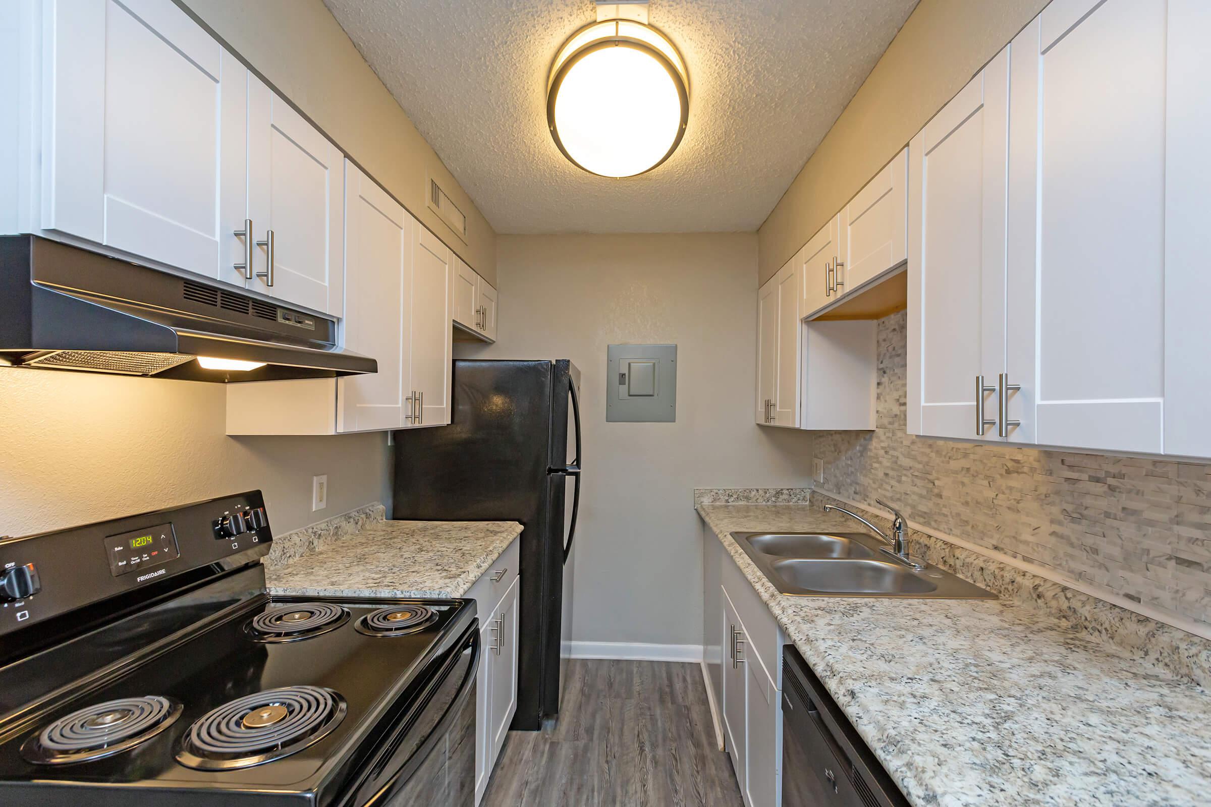 a modern kitchen with stainless steel appliances