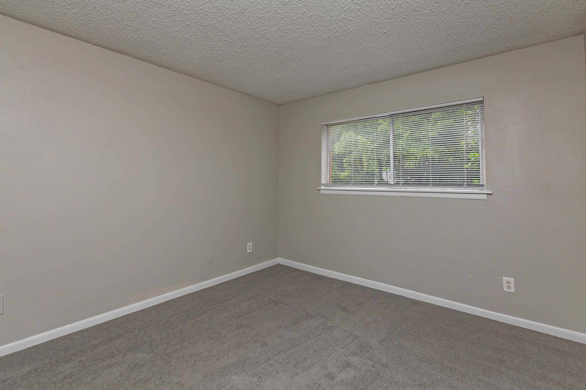 a room with a sink and a window