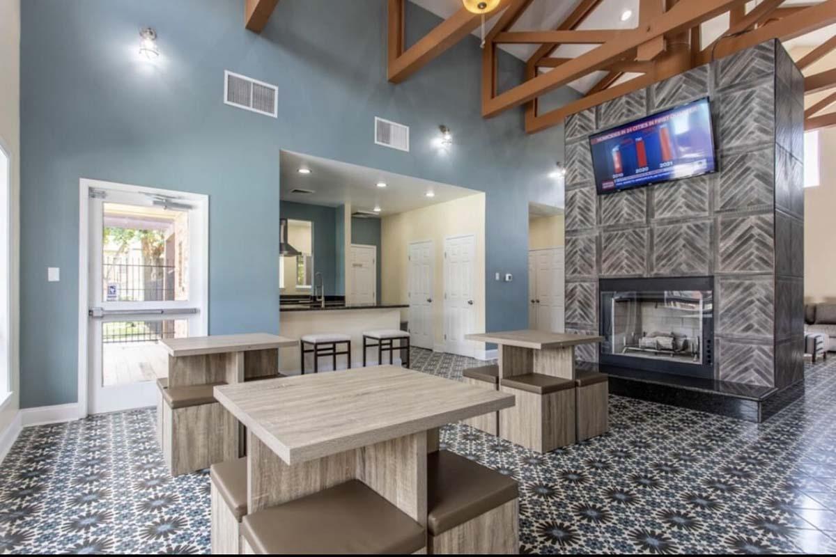 a living room filled with furniture and a fireplace