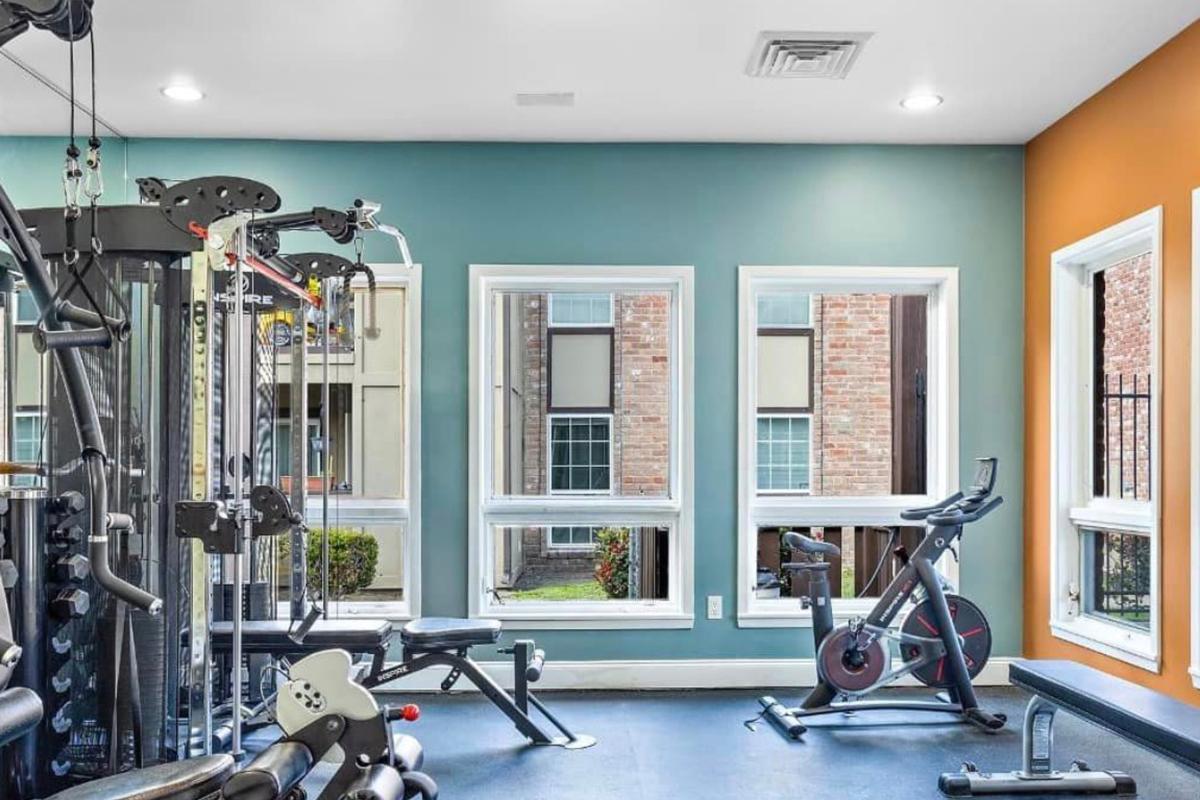 a room filled with furniture and a motorcycle