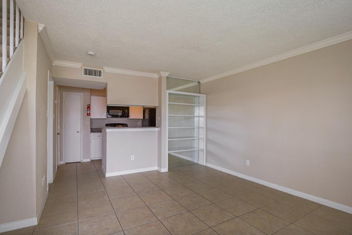 a kitchen with a tile floor