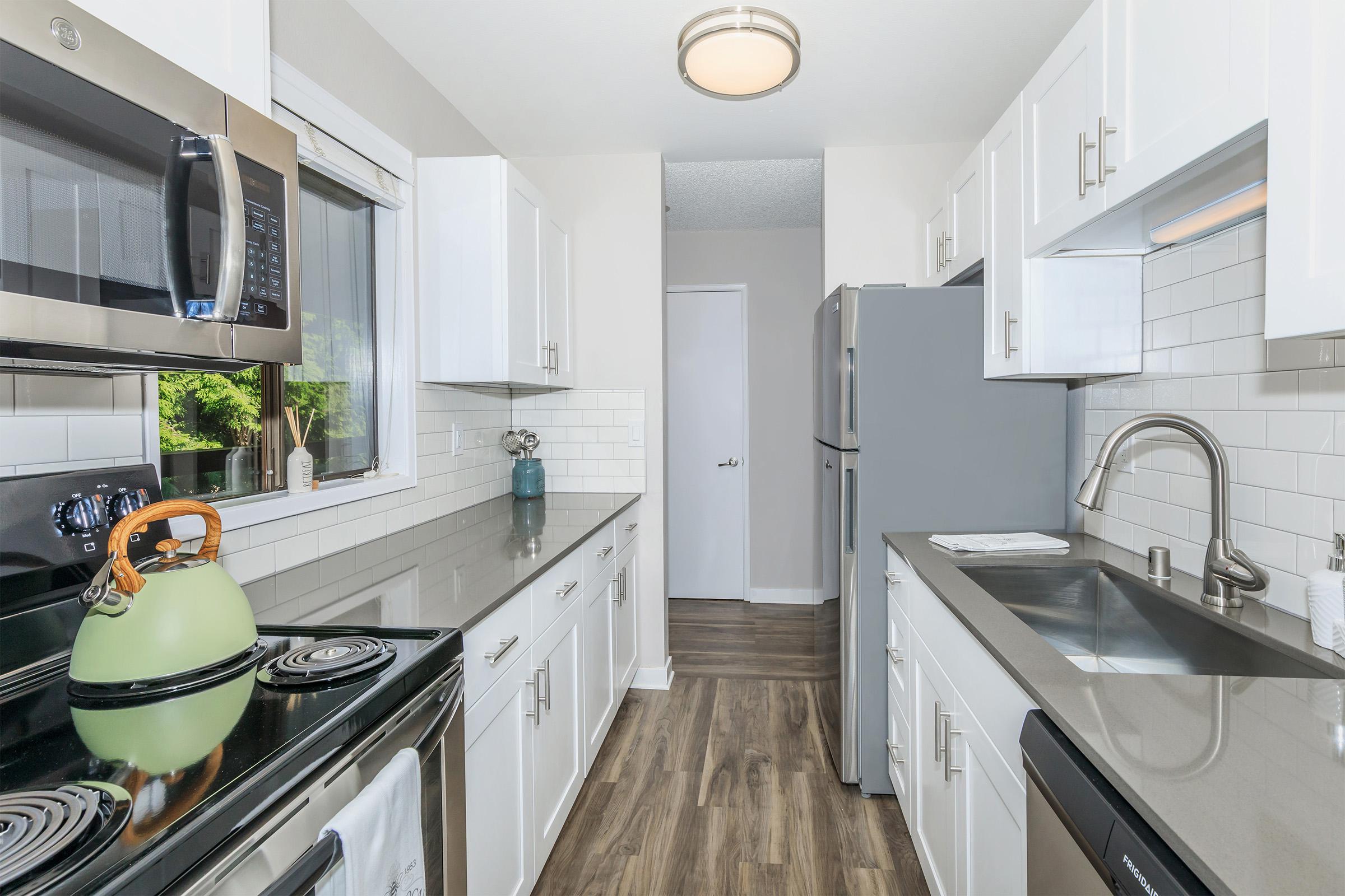 a kitchen with a sink and a counter