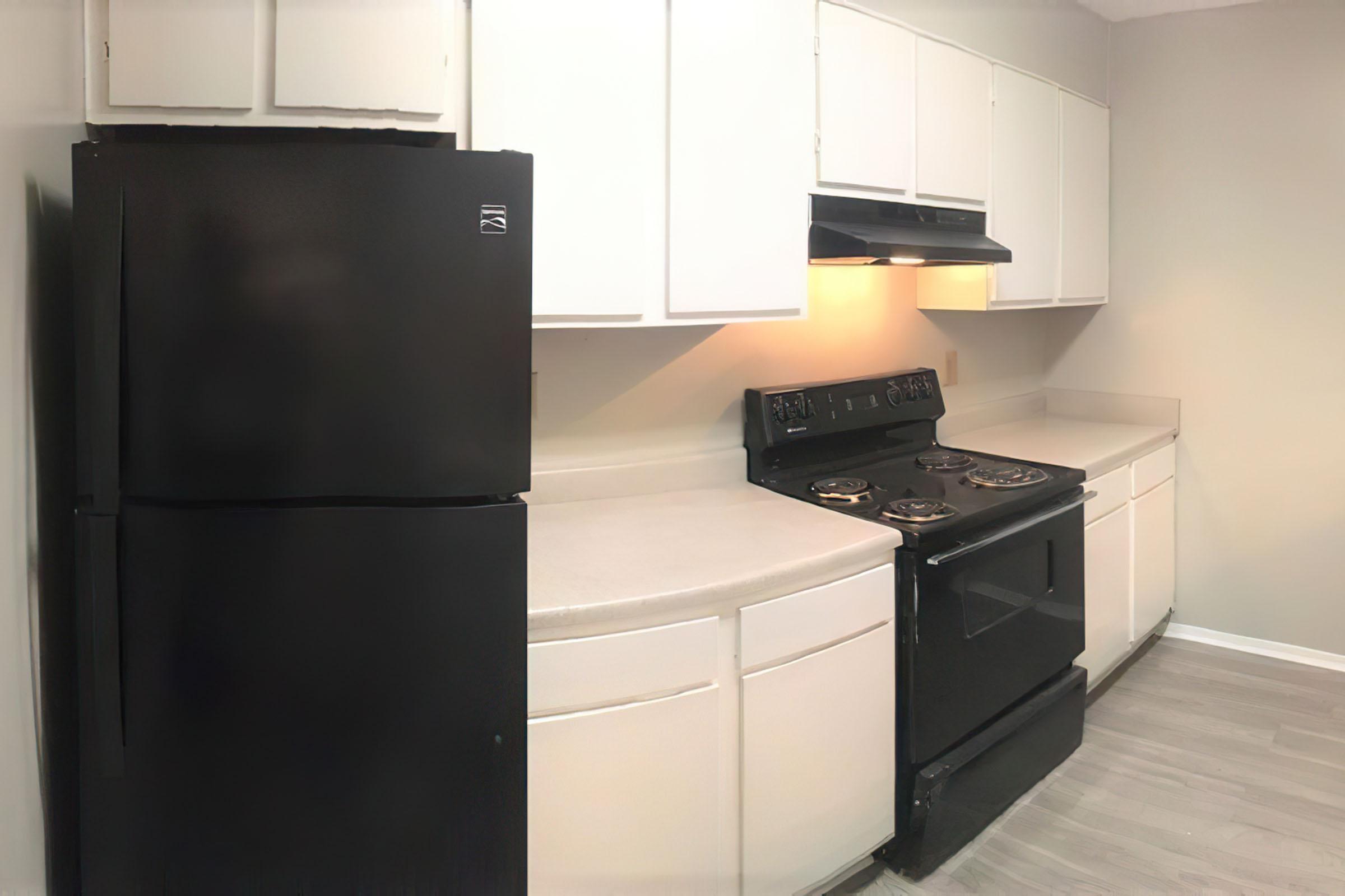 a stainless steel refrigerator in a kitchen