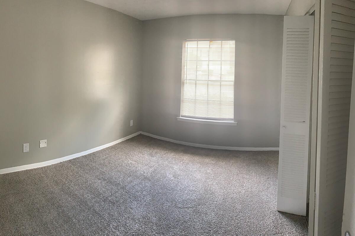a door with a window in a room