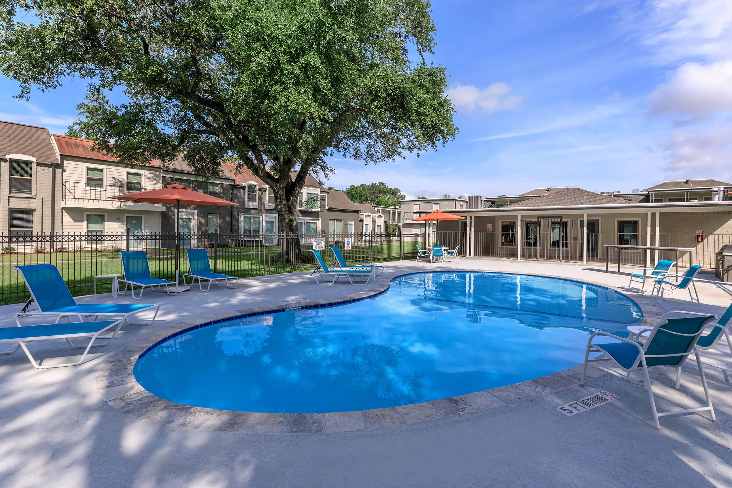 RELAX BY THE SHIMMERING SWIMMING POOL