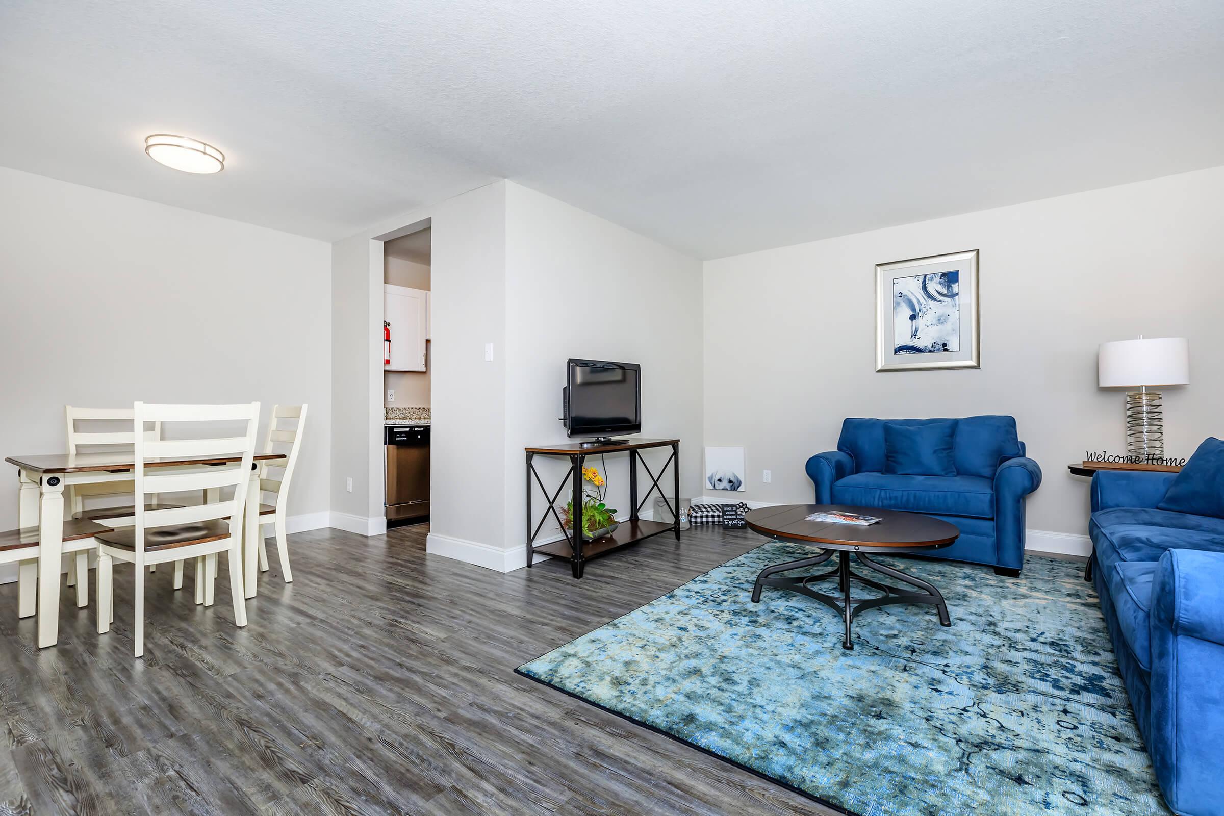 a living room filled with furniture