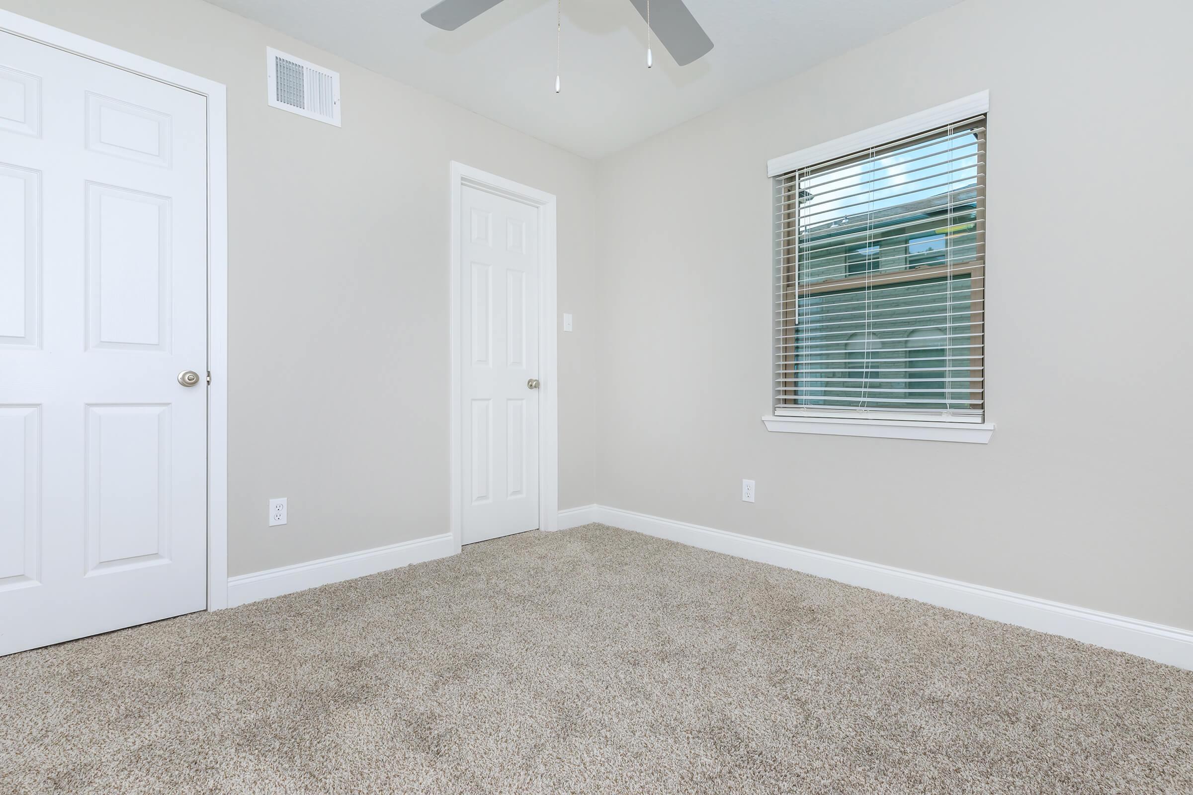 a room with a sink and a window