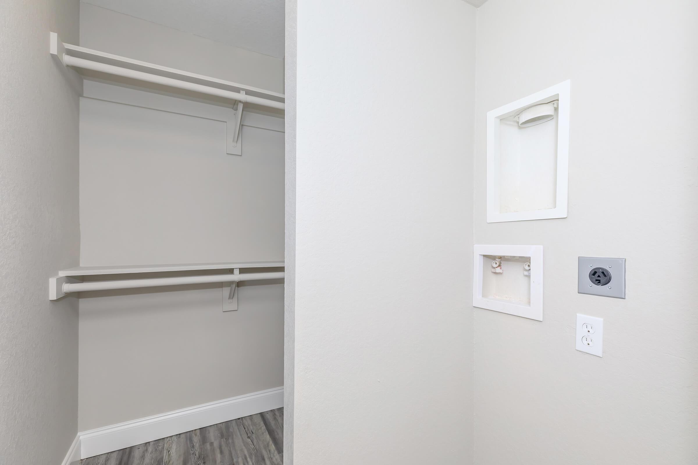 a white refrigerator freezer sitting in a room