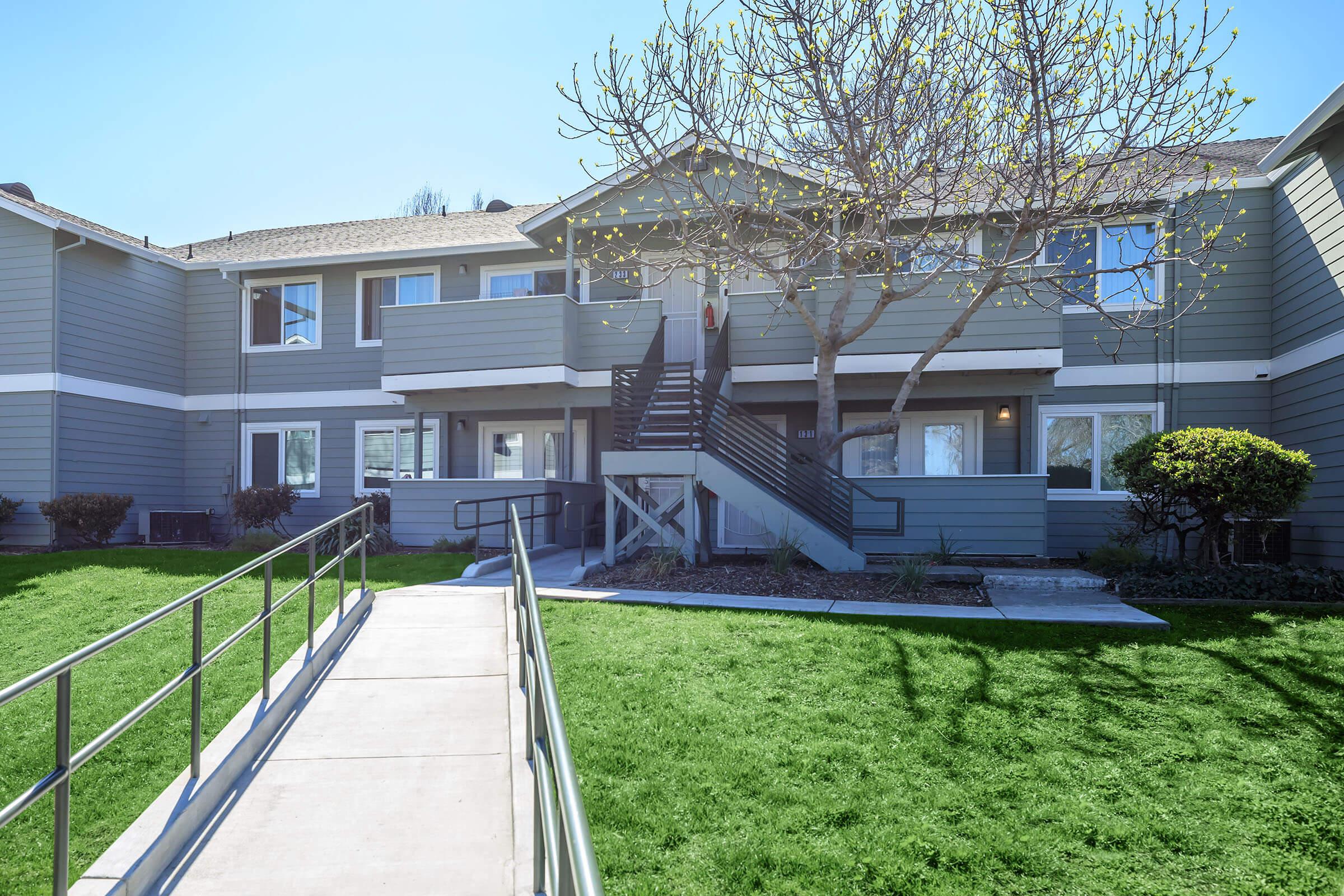 The community building with green grass