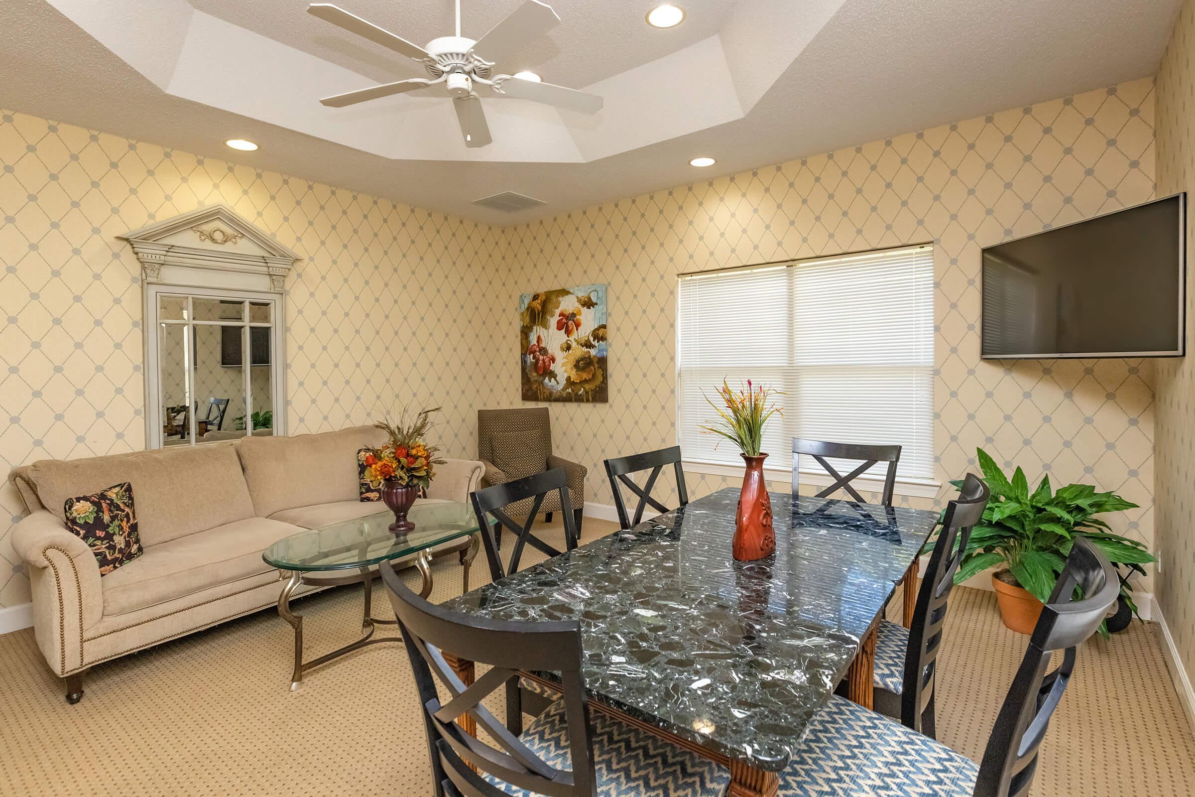 a room filled with furniture and a fireplace