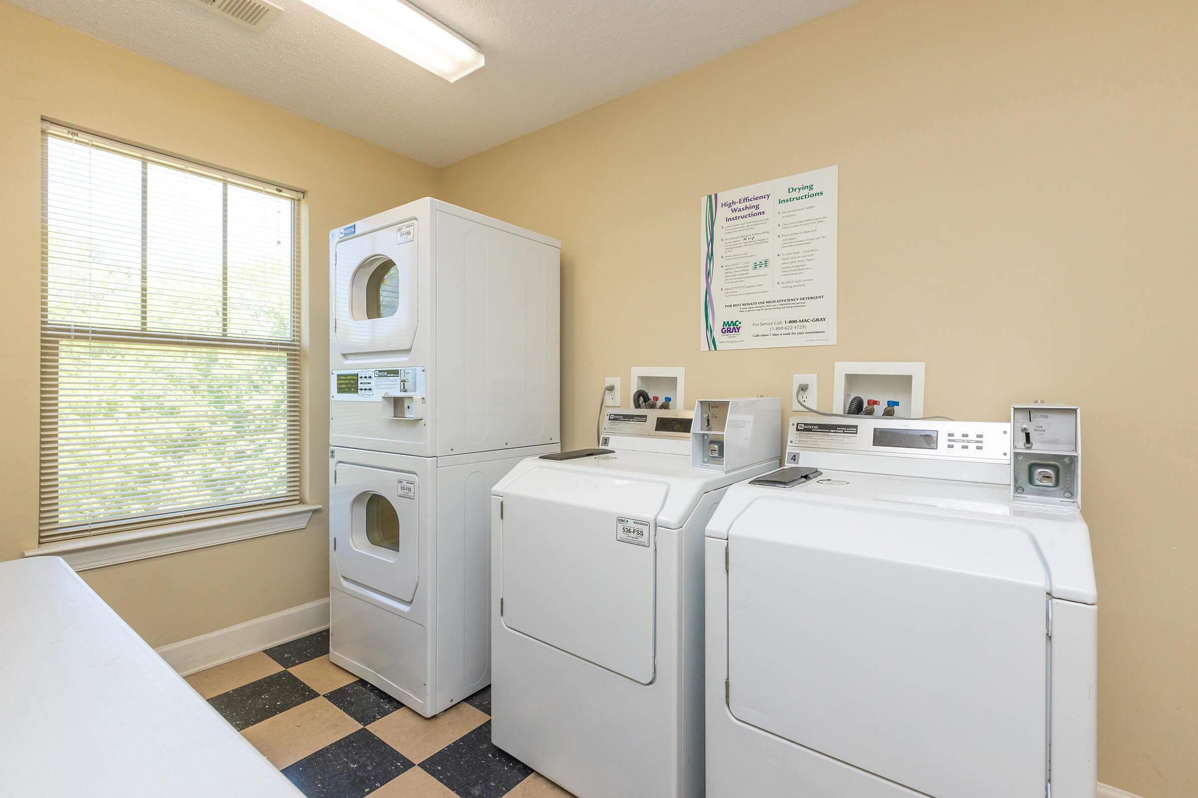 a refrigerator freezer sitting in a room