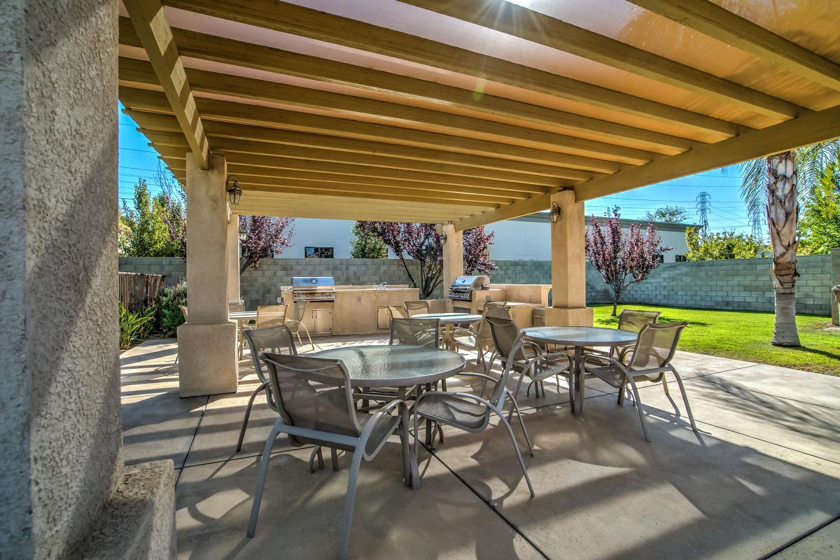 Pergola with tables and chairs