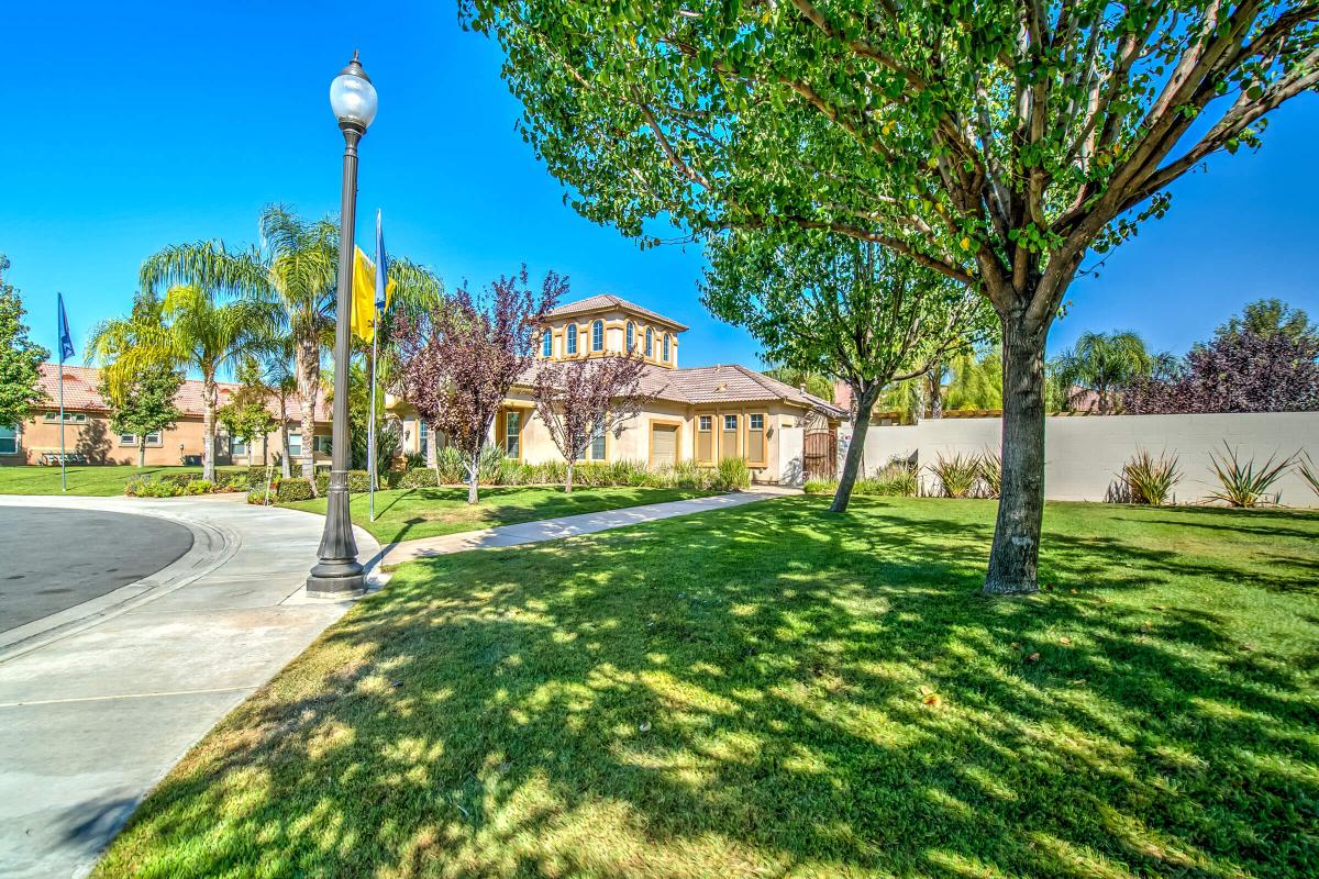 Community building with green grass and trees