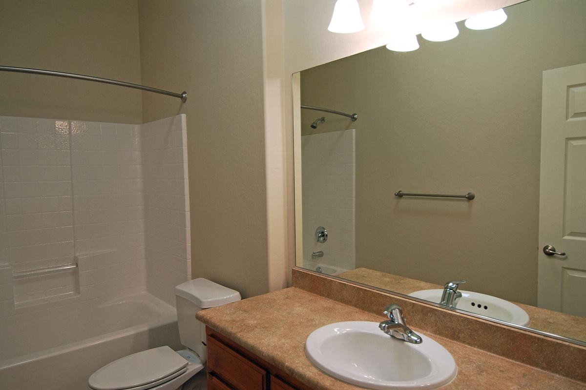 Bathroom with tan countertops